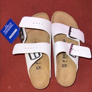 Birkenstock White Sandals with Silver Buckles